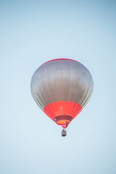 colorful hot air balloon flies in the sky