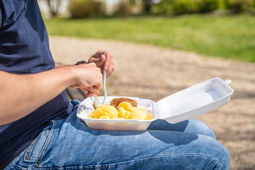 takeaway food, refreshed in nature from a polystyrene box.