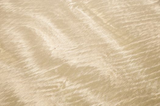 Abstract background of sand pattern on the beach