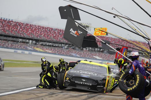 Ryan Blaney (12) makes a pit stop for the GEICO 500 at Talladega Superspeedway in Lincoln, Alabama.