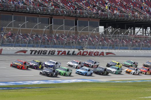 Denny Hamlin (11) races down the dogleg during the GEICO 500 at Talladega Superspeedway in Lincoln, Alabama.
