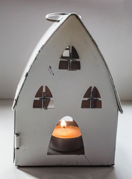Christmas house with candlelight