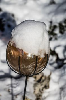 colorful glass balls in the winter landscape