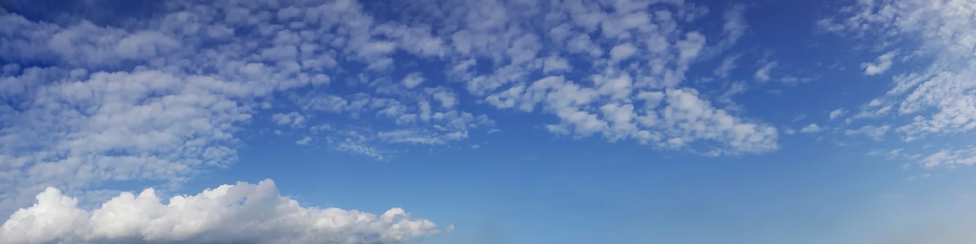 Panorama sky with cloud on a sunny day. Beautiful cirrus cloud.