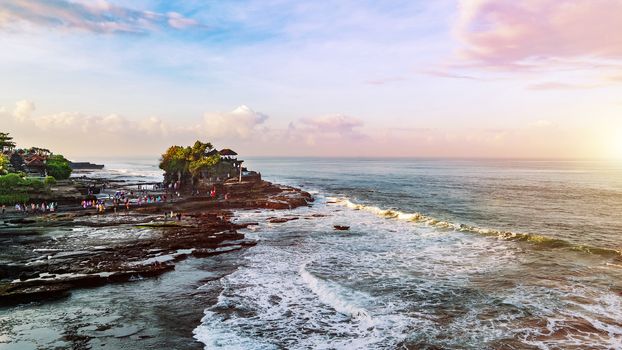 Tanah Lot & Batu Bolong temple. Long exposure effect, Bali Indonesia. Tropical nature landscape of Indonesia, Bali.