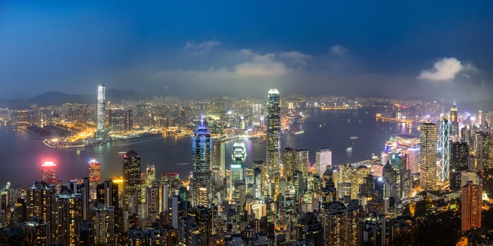 Panorama view of Hong Kong skyline on the evening seen from Victoria peak, Hong Kong, China.