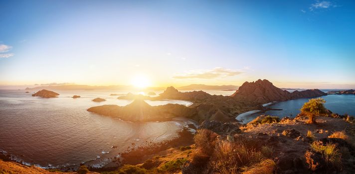 Panoramic scenic view of Padar Island during sunset with dramatic sky, Palau Padar, Komodo National Park, Indonesia