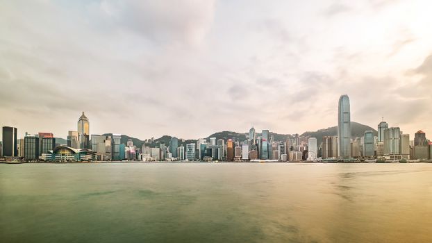 Hong Kong skyline before sunset seen from Kowloon, Hong Kong, China.