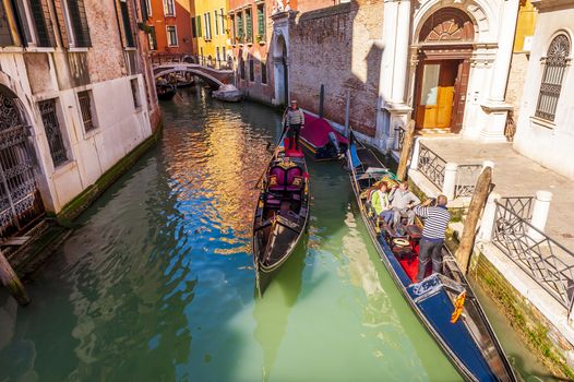 Circulation of gondolas on a canal in Venice, Veneto in the north-east of Italy.