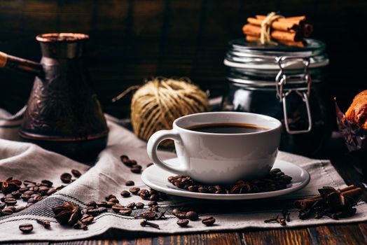 White cup of turkish coffee with spices