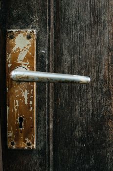 Antique handle of a wooden door