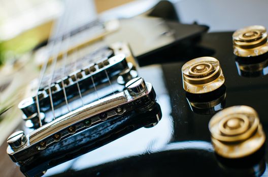 Parts of a guitar, bridge and pickups