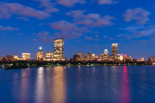 Night cityscape with reflections in water, Boston, USA