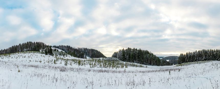 Cloudy sky over the snowy plain of central Russia