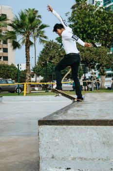 Skater practicing at the Miraflores skatepark in Lima - Peru