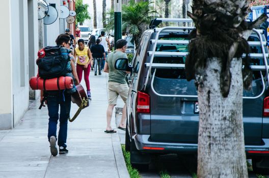 Backpacker walking through the streets of Barranco in Lima - Peru