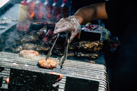 Cooking meat and chicken on the grill