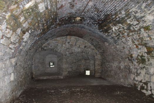 ancient dark secret passage of a castle in Italy