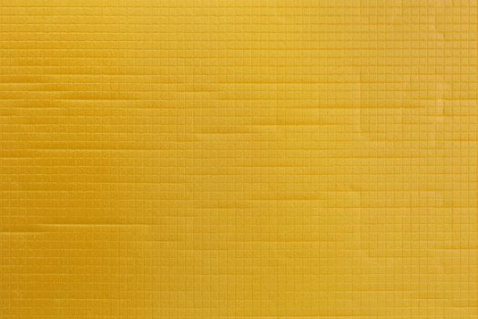 yellow soft sport or yoga foam mat surface flat texture and background.