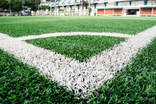 football yard field and grass at sport outdoor stadium, corner view. outdoor sport and fitness concept