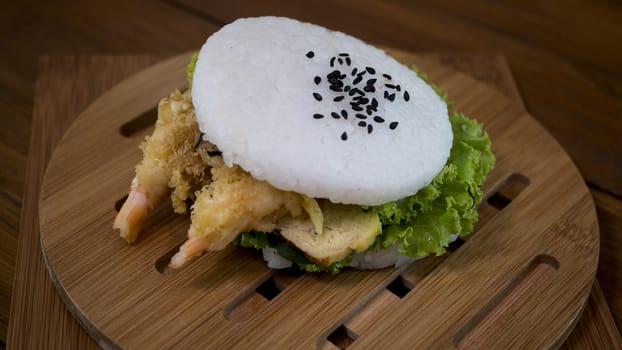 Japanese food concept. Homemade sushi rice burger with shrimp tempura , vegetable and tamagoyaki