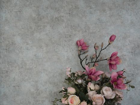 Bouquet of roses with grunge wallpaper for background