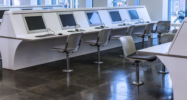 Freely accessible computer workstations for students in the main building of a university, Germany