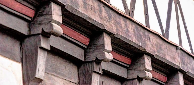 Partial view of a brown beam on a half-timbered house in Fallersleben, Germany