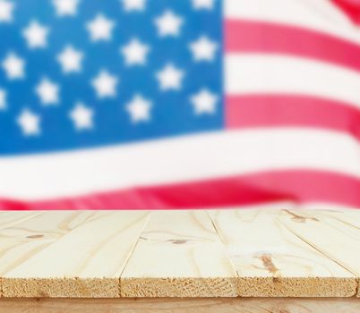 wooden table on USA flag background celebrate American Independence Day of 4th July