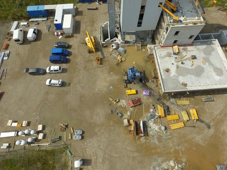 Vertical aerial photograph taken from a large construction site at 50 meters height with the drone