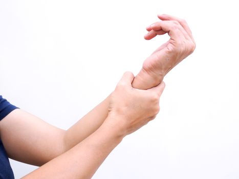 Close-up of Hand massage the wrist from pain. di cut hand of asian thai woman isolated on white background