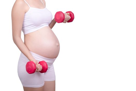 Pregnant exercises concept.A portrait of a Beautiful asian pregnant woman doing light exercise by using dumbbell  isolated on white background with clipping path. Anonymous face Asia female in her 20s