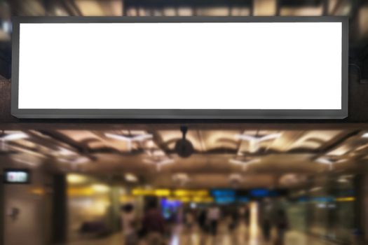 Airport advertising concept : Empty blank white screen advertising billboard frame hang in airport