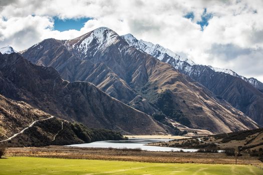 The stunning idyllic Moke Lake near Queenstown in Otago, New Zealand. This secluded, peaceful lake is a popular locale for camping, boating, hiking and horseback riding.