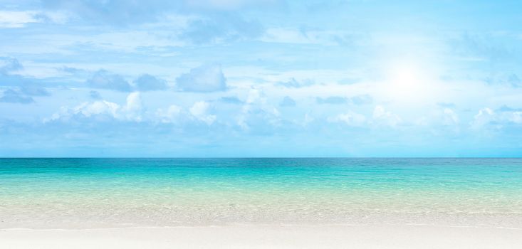 Panorama view of Transparent blue sea water background in Tropical summer beach, summer background.