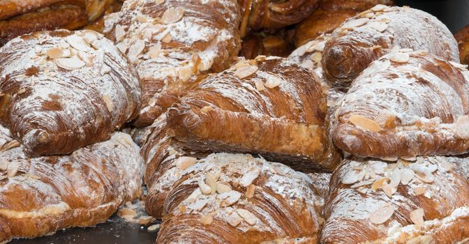 Almond Croissants for sale on a market