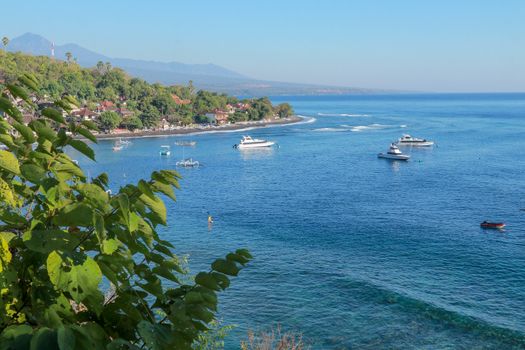 Jemeluk Bay, Amed. Amed is fast becoming a popular tourist destination in Bali, Indonesia. Set in the North-East of Bali, it is a home to excellent snorkeling, scuba diving, freediving and yoga.