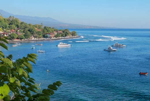 Jemeluk Bay, Amed. Amed is fast becoming a popular tourist destination in Bali, Indonesia. Set in the North-East of Bali, it is a home to excellent snorkeling, scuba diving, freediving and yoga.