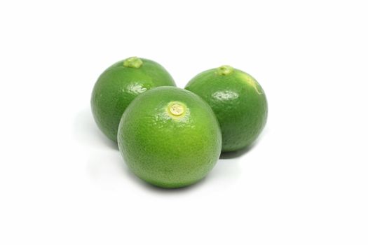 Fresh green lime fruit isolated on white background, green lime is an important ingredient of food in Asia.