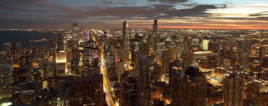 Atmospheric scene of Chicago at night showing Michigan Avenue and downtown