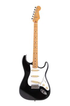 A vintage black and white electric guitar isolated on white with clipping path