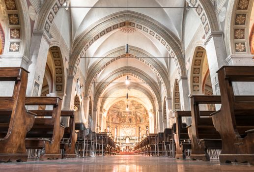 Inside a church in italy. Symbol of Christianity and Catholicism. Ideal for concepts or festivity. Bottom view.