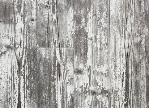 Rustic wooden planks background with peeling white paint