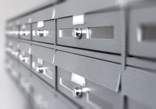 Aluminum mail boxes. Ideal for concepts such as safety and security, business communication and more. Shallow DOF.