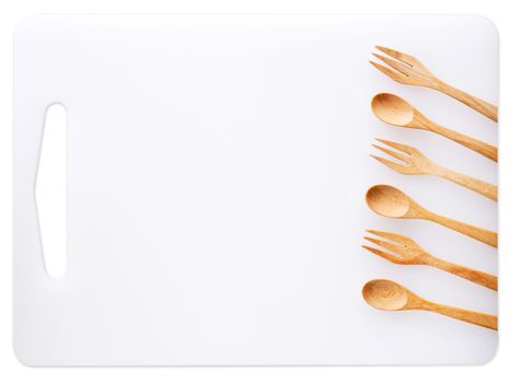 Set of utensils and cutting boards, wooden spoon and fork, Kitchen equipment about food with copy space