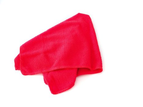 Red towel for wiping and cleaning isolated on white background.