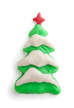 Isolated plasticine christmass tree with snow
