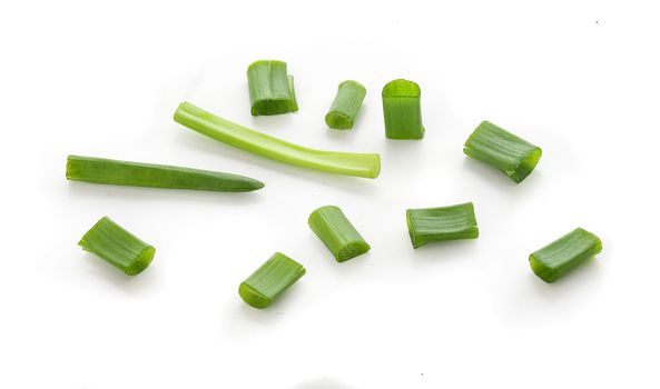 Isolated green spring onion on the white background