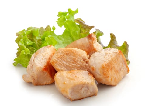 Fried chicken pieces with fresh green lettuce