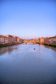 A view of the Arno River and the Ponte Vecchio in Florence, Italy.